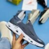 SKECHERSS SLIPS-INS GO RUN SWIRL CUSHION MEDICATED- GREY